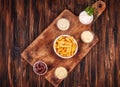French fries chips potato and sauces on wooden background. top view Royalty Free Stock Photo