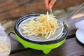 French fries cooking on deep fryer. Royalty Free Stock Photo