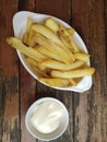 French fries with cream sauce top wive Royalty Free Stock Photo