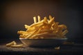 French fries on a dark background. Fried potatoes.