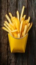 French fries displayed enticingly over a rustic wooden background Royalty Free Stock Photo