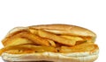 French fries fingers Texas spices sandwich in a long bun, French fries potatoes chips and fingers fried in boiling hot oil, Junk