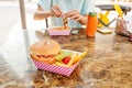 french fries and fresh American burger on the table with ketchup. Street food and fastfood concept Royalty Free Stock Photo