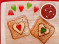 French fries and fresh vegetables chopped in the shape of a heart. Royalty Free Stock Photo