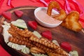 French fries and fresh vegetables chopped in the shape of a heart. Royalty Free Stock Photo