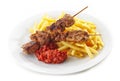 French fries and grilled kebab meat Royalty Free Stock Photo