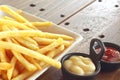 French fries with ketchup and mayonnaise, top view of potato fry Royalty Free Stock Photo