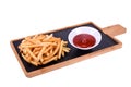 French fries with ketchup on a wooden board isolated on a white background Royalty Free Stock Photo