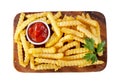 French fries with ketchup on a wooden board isolated on white background Royalty Free Stock Photo