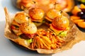 french fries and Mini burgers for a children's party or picnic. Royalty Free Stock Photo