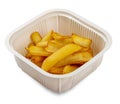 French fries. In a plastic container. Food to go. On a light background Royalty Free Stock Photo