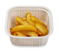 French fries. In a plastic container. Food to go. On a light background Royalty Free Stock Photo