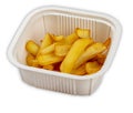 French fries. In a plastic container. Food to go. On a light background Royalty Free Stock Photo