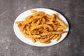 French Fries and potato chips served in dish isolated on background top view of bangladesh food Royalty Free Stock Photo