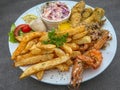 French fries with seafood Royalty Free Stock Photo