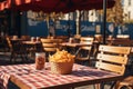 french fries on a table in an outdoor restaurant Royalty Free Stock Photo