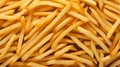 French fries texture close up background. Junk food fast meal restaurant cafe salty snack calorie potato fries photo Royalty Free Stock Photo