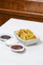 French fries with three dips, barbecue, mayo and ketchup Royalty Free Stock Photo