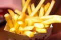 French fries in white box. Cost up Royalty Free Stock Photo