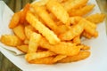 French fries on white papaer Royalty Free Stock Photo