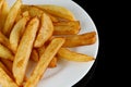 French fries on a white plate. Tasty potato fries for food or snack Royalty Free Stock Photo