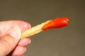 French Fry with Ketchup Royalty Free Stock Photo
