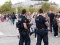 French Gendarmerie men on patrol in the street of Paris, France