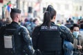 french gendarmerie riot policewoman walking in the street