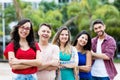 French girl with male and female young adults in line Royalty Free Stock Photo