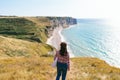 A French girl watching the Etretat cliffs Royalty Free Stock Photo