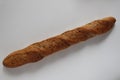 French Greek baguette bread on a white background top view