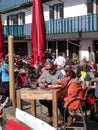French holiday skiers relax at an outdoor restaurant