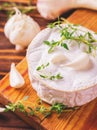 French homemade Camembert cheese with thyme and garlic