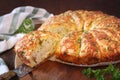 French homemade sourdough white bread with garlic, grated cheese and parsley