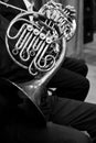 French horn in the hands of the musicians in the orchestra Royalty Free Stock Photo