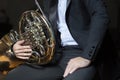 French horn instrument. Hands playing horn player Royalty Free Stock Photo