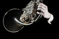 French horn player hands. Hornist playing brass music instruments