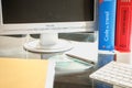 French labor code book pictured with computer in studio