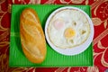 French loaf or baguette served with fried egg Royalty Free Stock Photo