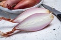 French long pink shallots grappe onion from Brittany, France Royalty Free Stock Photo