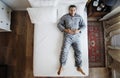 French man sleep alone on bed Royalty Free Stock Photo