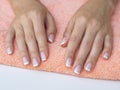 French manicure in a beauty salon. Woman hand care. Hands and spa relaxing. Beauty woman nails Royalty Free Stock Photo