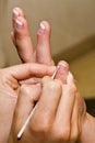 French manicure in progress Royalty Free Stock Photo