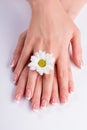 French manicure with white daisy.