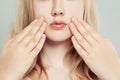 French manicure. Woman touching her face her hand with manicured nails Royalty Free Stock Photo