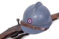 French military helmet of the First World War with rifle on whit