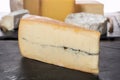 French Morbier cheese on a slate plate Royalty Free Stock Photo