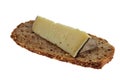 French mountain tomme on a slice of bread isolated