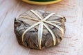 French mountains cheese banon made in Alpes-de-haute-provence in chestnut leaves from unpasteurised goat milk