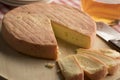 French Munster cheese and slices Royalty Free Stock Photo